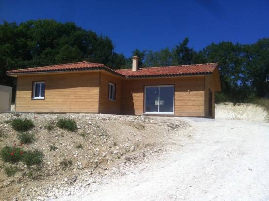 maison bois avec tuile à ondes et bardage douglas près d'Auch 32